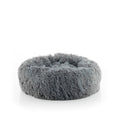 Grey round plush pet bed with a raised rim on a white background.