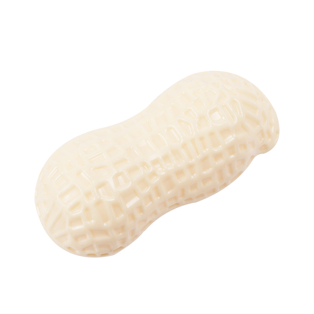 Cream peanut-shaped squeaky dog toy on a white background.